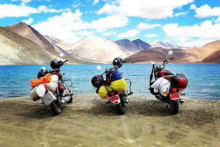 Mode of transport,Vehicle,Mountain range,Travel,Tourism,Scooter,Mountain,Motorcycle,Adventure,Motorcycling