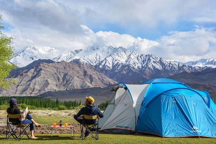 Camping,Tent,Mountainous landforms,Grassland,Mountain,Mountain range,Wilderness,Fell,Recreation,Leisure