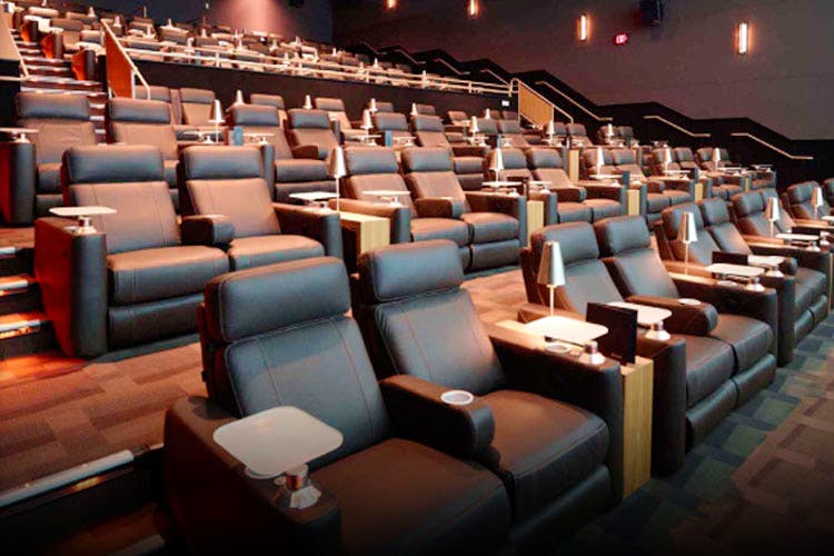 Auditorium,Theatre,Building,Room,heater,Movie theater,Chair,Performing arts center,Interior design,Audience