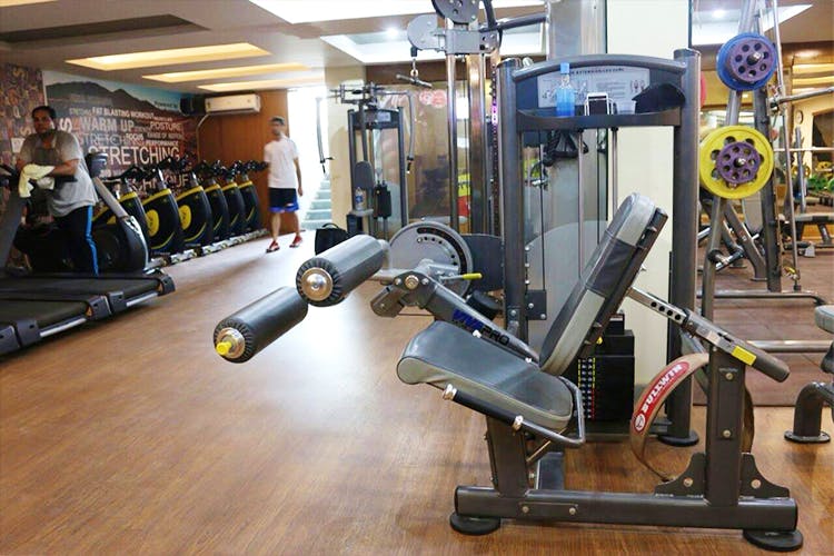 Gym,Room,Exercise equipment,Exercise machine,Sport venue,Physical fitness,Weightlifting machine,Floor,Flooring,Exercise
