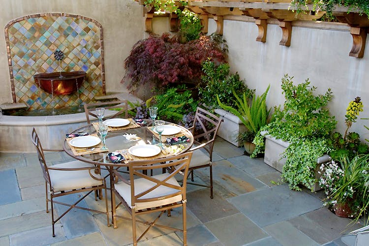 Property,Table,Patio,Outdoor table,Furniture,Backyard,Room,Tablecloth,Garden,Yard