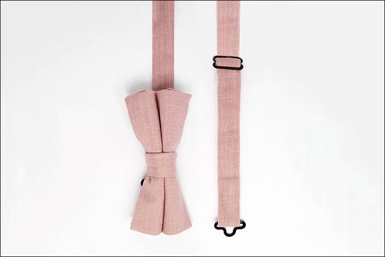 Suspenders,Belt,Pink,Tie,Strap,Joint,Fashion accessory,Beige,Leather,Bow tie