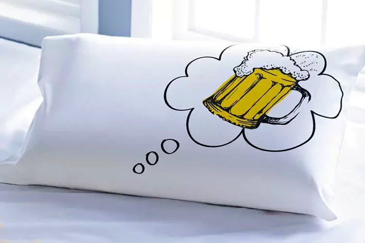 Pillow,Bedding,Yellow,Cushion,Textile,Linens,Throw pillow,Furniture,Bed sheet,Rectangle