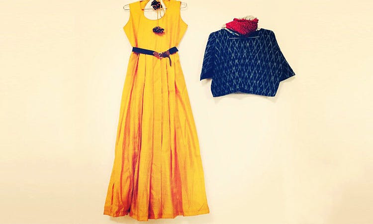 Clothing,Dress,Yellow,Day dress,Fashion design,Costume design,Pattern,One-piece garment,Pattern,Design