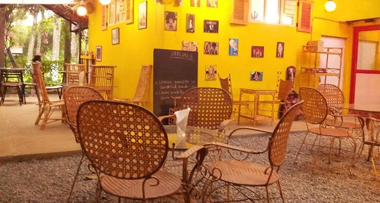 Room,Yellow,Furniture,Property,Chair,Interior design,Table,Restaurant,Building,House