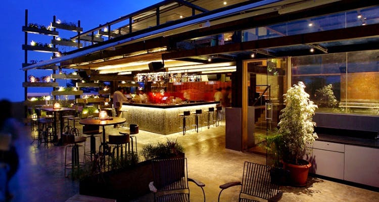 Restaurant,Lighting,Building,Bar,Night,Architecture,Interior design,Home,Hotel