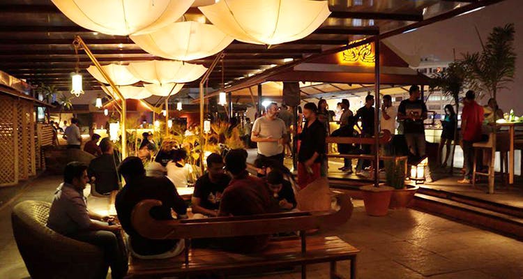 Lighting,Night,Crowd,Food court,Restaurant,Event,Building,Café