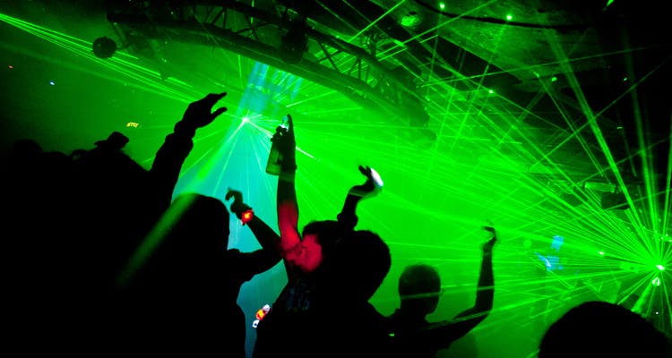 Green,Visual effect lighting,Light,Performance,Laser,Technology,Event,Party,Music venue,Disco
