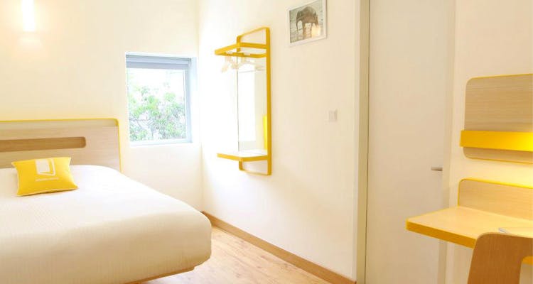 Room,Furniture,Property,Yellow,Interior design,Bed,Floor,Building,Suite,Bedroom