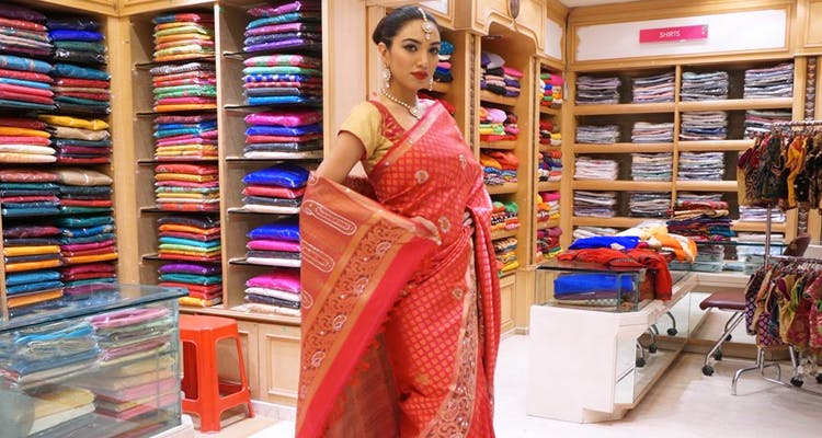 Sari,Textile,Dress,Boutique,Fashion design,Retail,Room,Outlet store,Furniture,Shopping