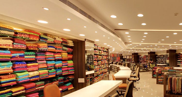 Building,Retail,Outlet store,Interior design,Bookselling,Room,Shelf,Ceiling,Furniture,Public library
