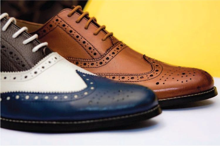 Footwear,Shoe,Brown,Tan,Product,Outdoor shoe,Still life,Brand