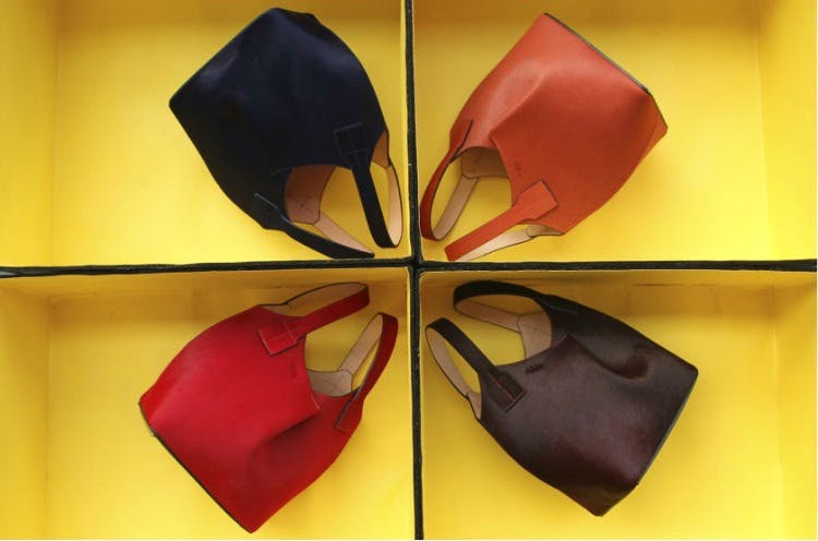 Red,Yellow,Footwear,Origami,Fashion accessory,Cap,Carmine