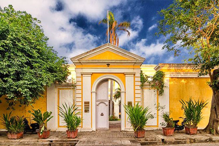 Building,Property,Sky,House,Real estate,Home,Architecture,Yellow,Tree,Facade