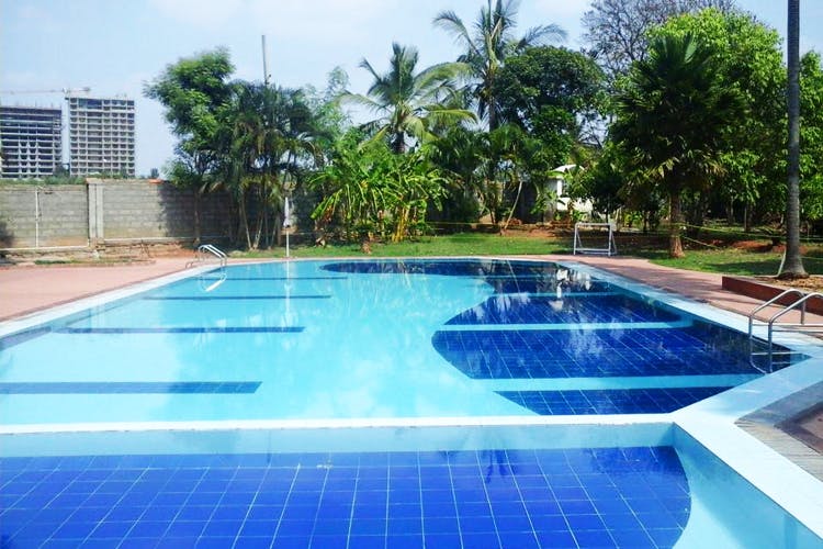 Swimming pool,Property,Leisure,Real estate,Resort,Building,Leisure centre,Home,Condominium,House