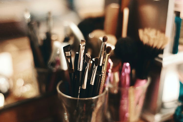 Brush,Makeup brushes,Tool,Cosmetics,Material property,Room,Makeup artist,Collection,Hand tool,Metal