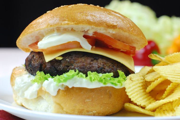 Dish,Food,Cuisine,Junk food,Hamburger,Fast food,Breakfast sandwich,Ingredient,Cheeseburger,Buffalo burger