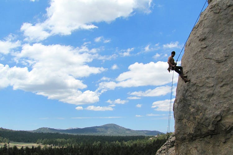 Rock climbing,Climbing,Sport climbing,Adventure,Rock,Abseiling,Sky,Formation,Free climbing,Recreation