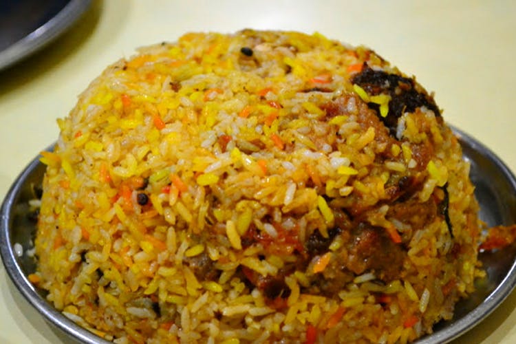 Dish,Cuisine,Spiced rice,Puliyogare,Food,Rice,Yeung chow fried rice,Biryani,Thai fried rice,Hyderabadi biriyani
