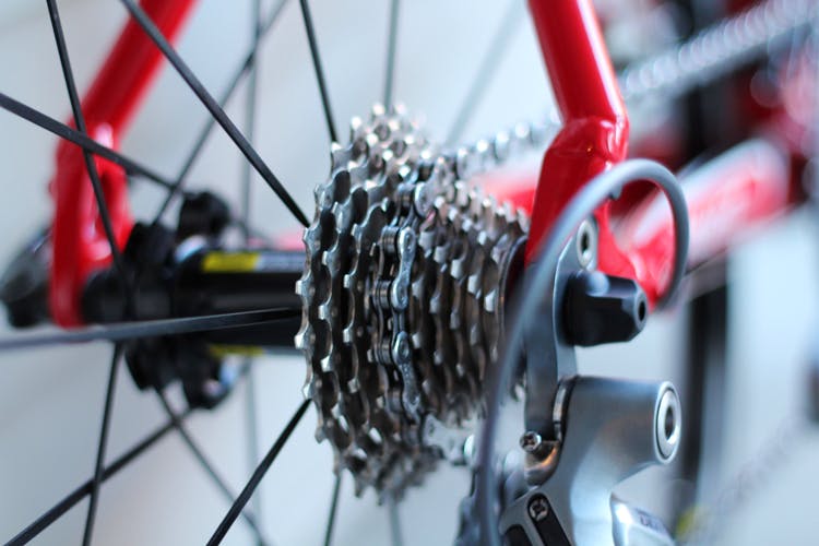 Bicycle wheel,Bicycle part,Bicycle tire,Bicycle drivetrain part,Groupset,Spoke,Bicycle chain,Bicycle,Rim,Vehicle