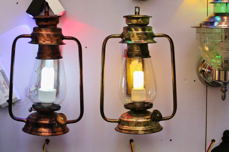 Lighting,Light fixture,Lamp,Lantern,Candle holder,Glass,Oil lamp,Sconce,Antique,Brass