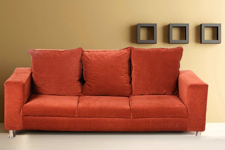 Couch,Furniture,Sofa bed,Orange,Room,studio couch,Comfort,Leather,Living room,Interior design