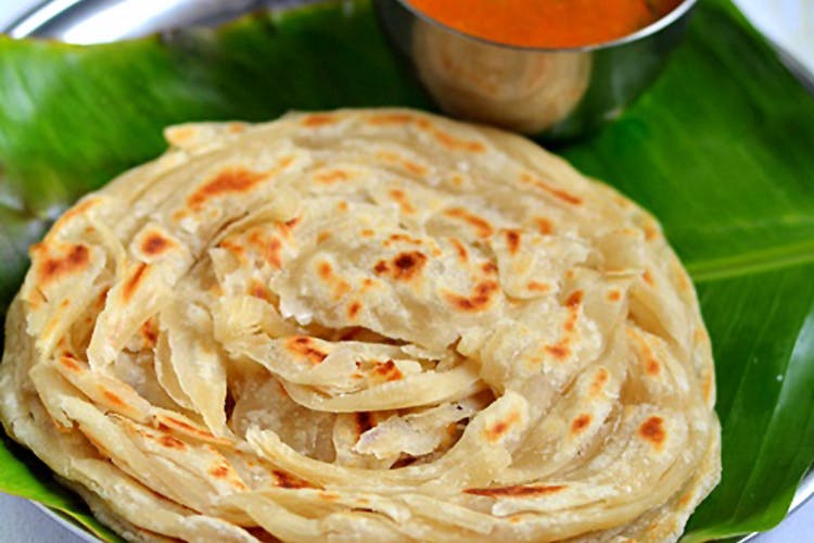 Dish,Food,Cuisine,Kerala porotta,Ingredient,Spring pancake,Roti canai,Roti prata,Produce,Indian cuisine