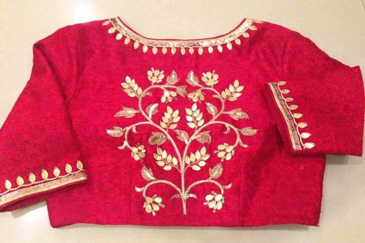 Clothing,Red,Embroidery,Maroon,Pink,Sleeve,Magenta,Outerwear,Textile,Blouse