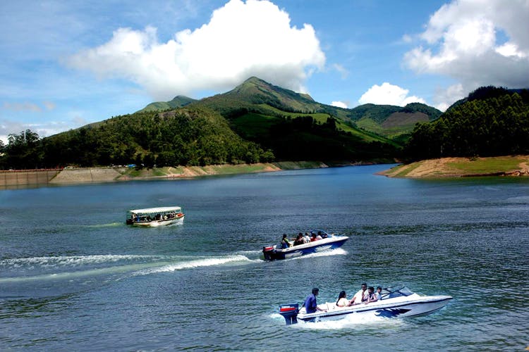 Water transportation,Boat,Boating,Vehicle,Recreation,Lake,River,Lake district,Watercraft,Sky