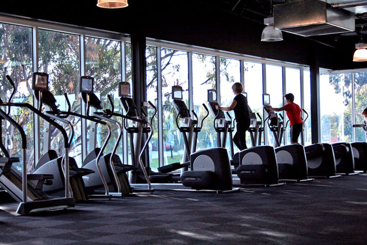 Gym,Sport venue,Exercise machine,Treadmill,Room,Physical fitness,Exercise,Exercise equipment,Leisure,Elliptical trainer