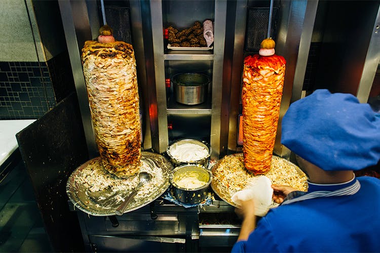 Street food,Food,Snack,Cuisine,Shawarma,Fast food,Dish,Vegetarian food,Mediterranean food