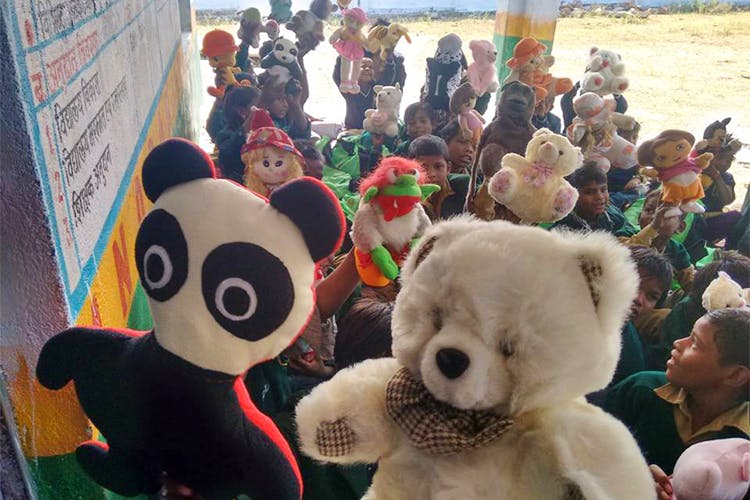 Stuffed toy,Teddy bear,Panda,Bear,Plush,Toy,Textile,Mascot,Fur,Recreation