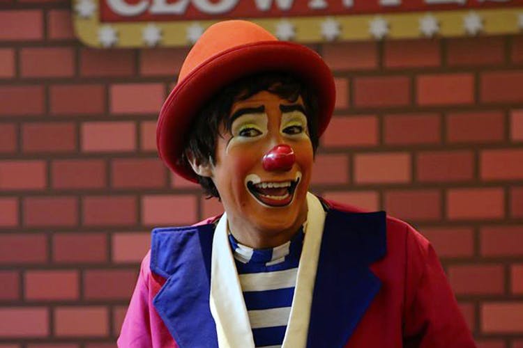 Clown,Facial expression,Nose,Performing arts,Smile,Laugh,Comedy,Fun,Rodeo clown,Performance