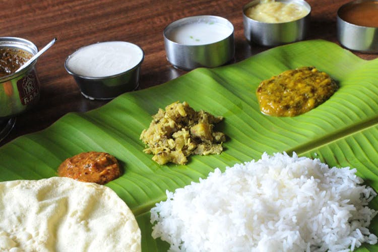 Dish,Food,Cuisine,Sadya,Banana leaf rice,Ingredient,Steamed rice,Andhra food,Tamil food,White rice