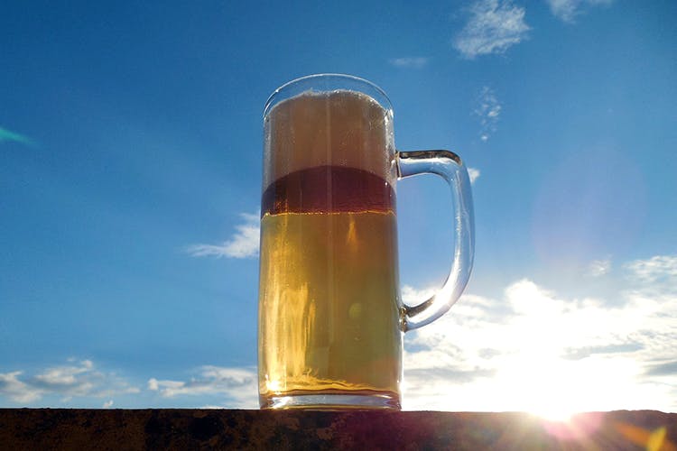 Sky,Beer glass,Mug,Beer stein,Glass,Water,Beer,Drink,Drinkware,Pint