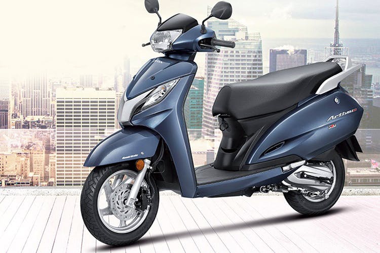 Land vehicle,Vehicle,Scooter,Automotive design,Car,Motor vehicle,Motorcycle,Mode of transport,Spoke,Moped