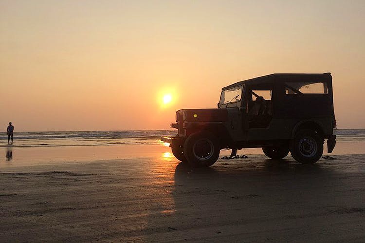 Vehicle,Automotive tire,Car,Off-roading,Tire,Sand,Off-road vehicle,Automotive exterior,Sunset,Beach