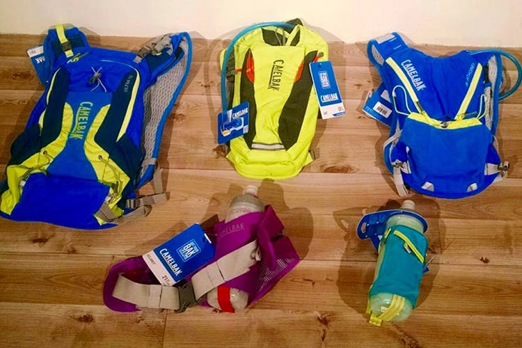 Blue,Sports uniform,Personal protective equipment,Yellow,Cobalt blue,Electric blue,Footwear,Sportswear,Outerwear,Vest
