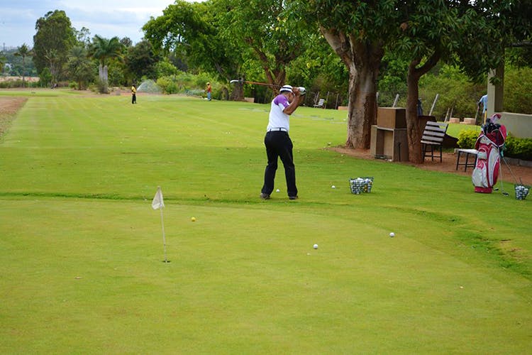 Sport venue,Golfer,Professional golfer,Golf course,Golf club,Golf equipment,Lawn,Pitch and putt,Recreation,Grass