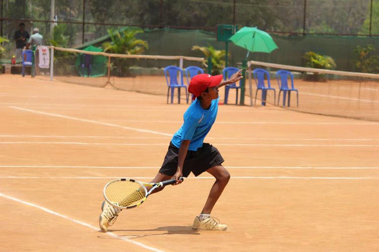 Sports,Tennis,Soft tennis,Racquet sport,Sports equipment,Ball game,Rackets,Sport venue,Tournament,Tennis player