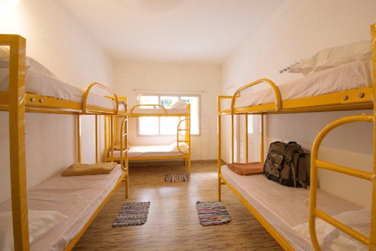 Room,Yellow,Property,Bed,Furniture,Hostel,Building,Interior design,House,Floor