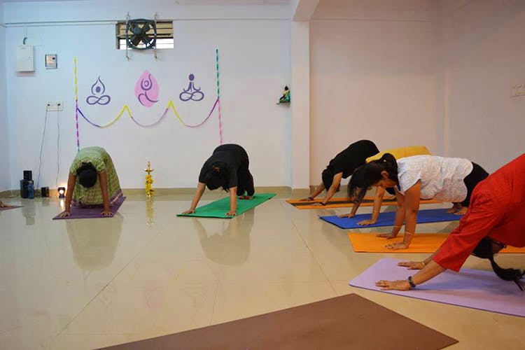 Yoga,Physical fitness,Floor,Flooring,Stretching,Room,Yoga mat,Pilates,Training,Mat