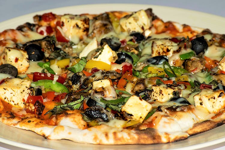 Dish,Food,Cuisine,Pizza,Flatbread,Ingredient,California-style pizza,Pizza cheese,Italian food,Manakish