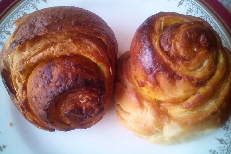 Food,Cuisine,Dish,Baked goods,Viennoiserie,Sweet Rolls,Pain au chocolat,Ingredient,Dessert,Croissant