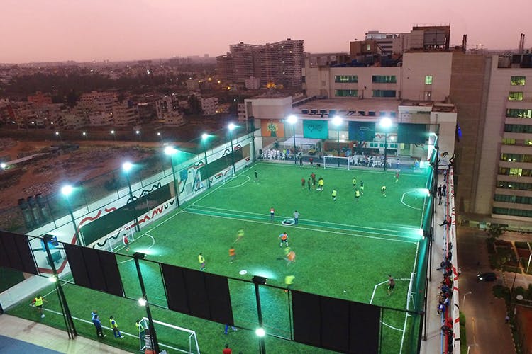 Sport venue,Stadium,Arena,Soccer-specific stadium,Green,Grass,Sports,Ball game,Tennis court,Team sport