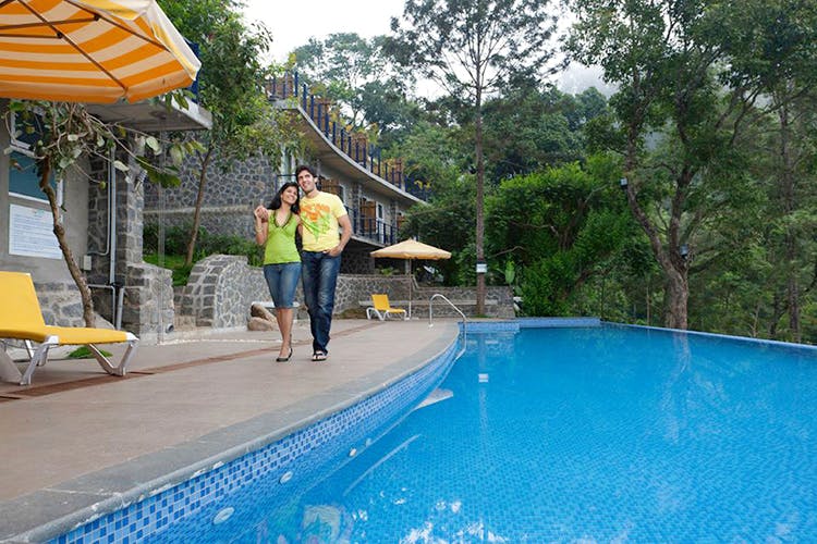 Swimming pool,Leisure,Vacation,Water,Fun,Resort,Tree,Real estate,Recreation,House
