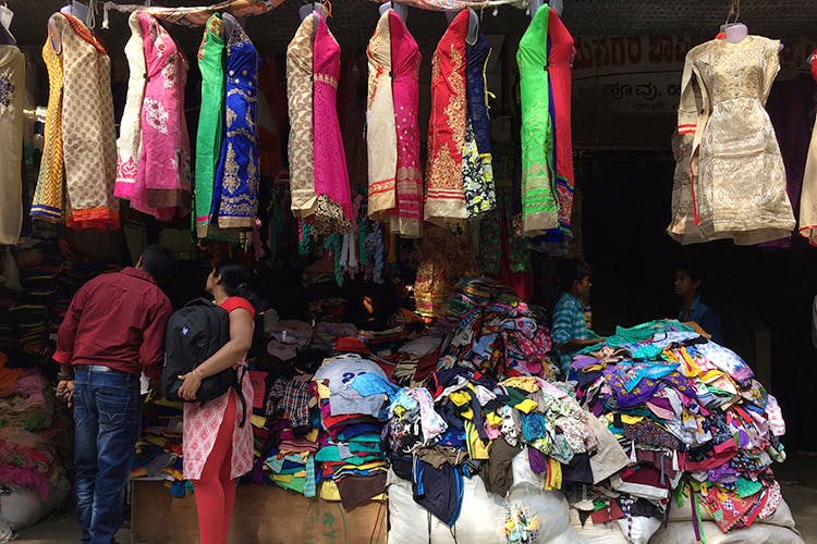 Selling,Public space,Human settlement,Bazaar,Fashion,Market,Textile,Dress,Boutique,Temple