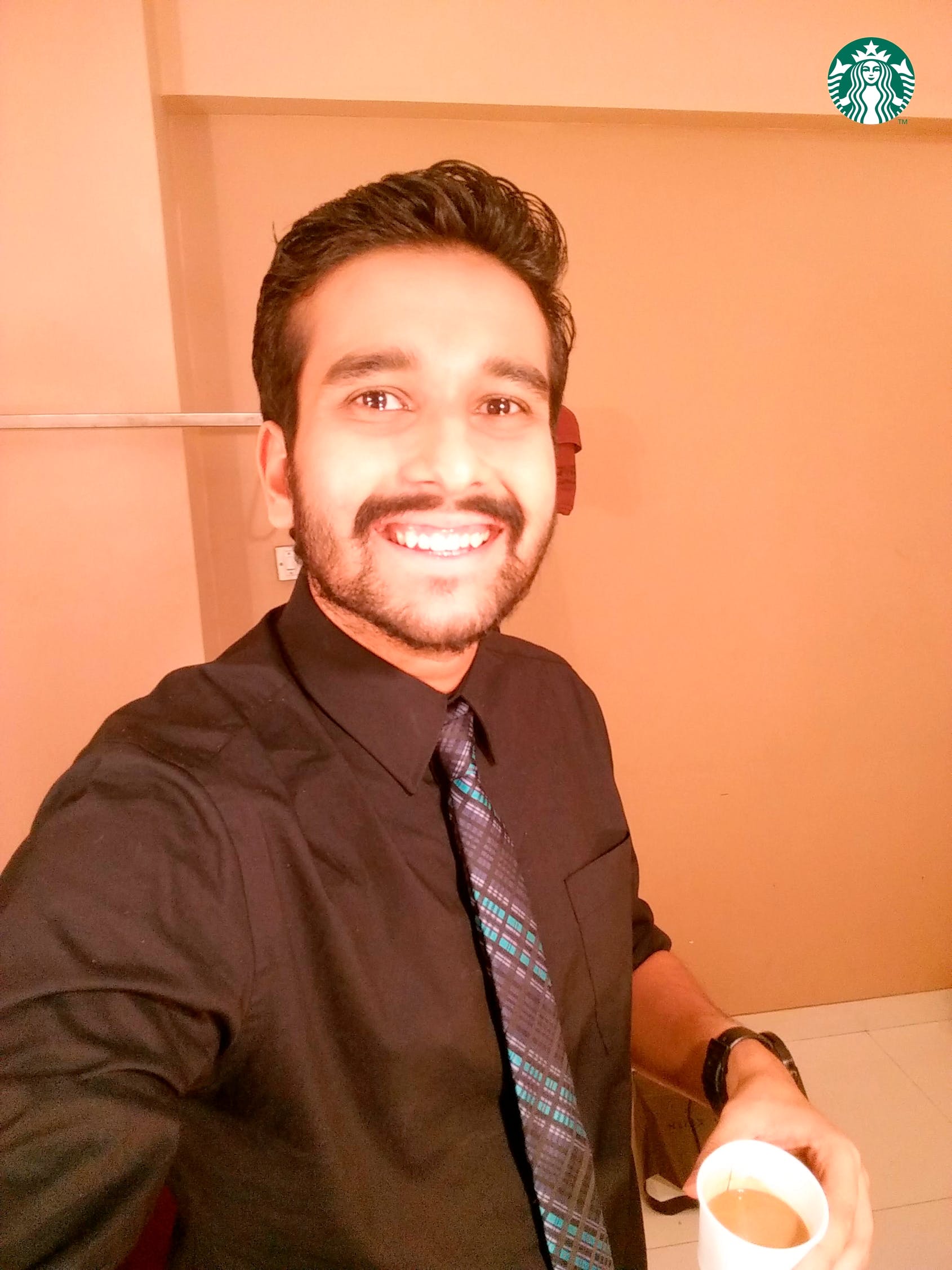 Hair,Facial hair,Beard,Gentleman,Smile,Moustache,Formal wear