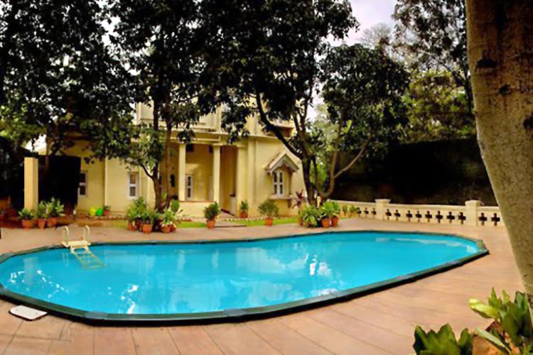 Swimming pool,Property,Building,Estate,Real estate,Home,House,Leisure,Hacienda,Villa