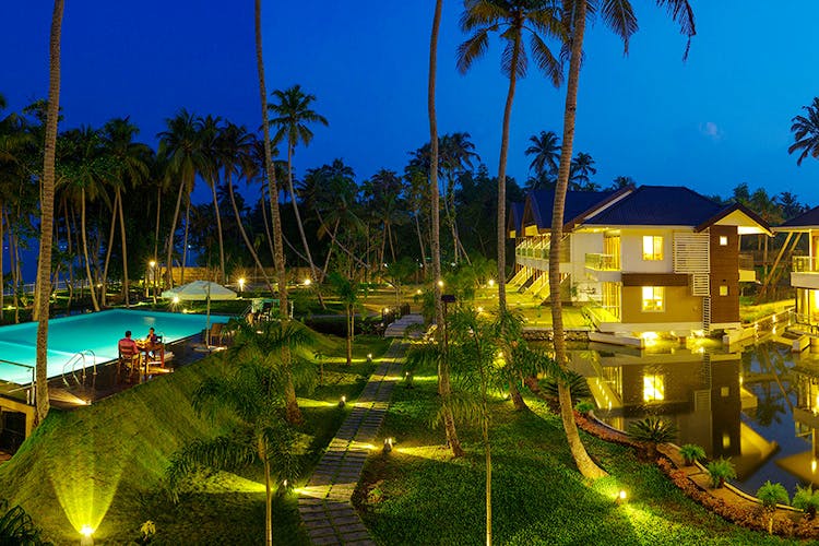 Resort,Lighting,Tree,Palm tree,Night,Property,Sky,Tropics,Vacation,Home